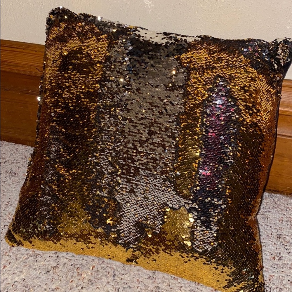 Gold and silver sequined pillow